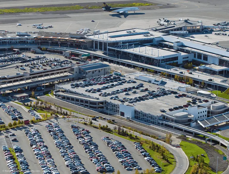 anchorage south terminal airport parking garage logo
