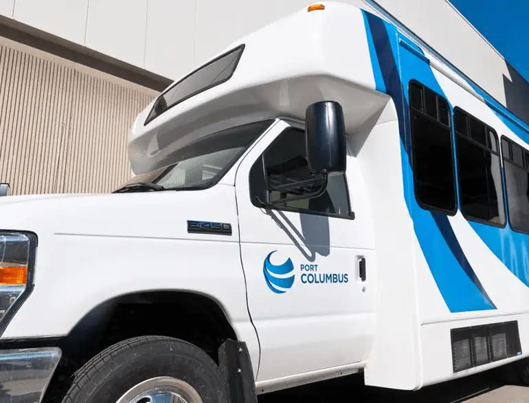 columbus airport green long term shuttle parking lot logo
